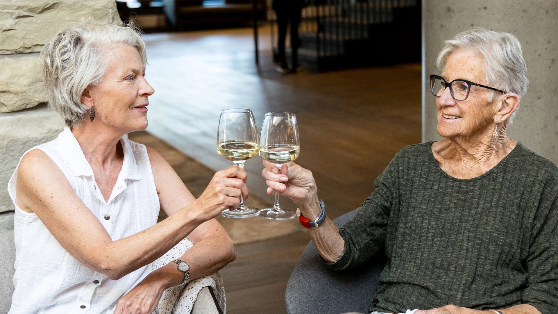 Two women drinking wine