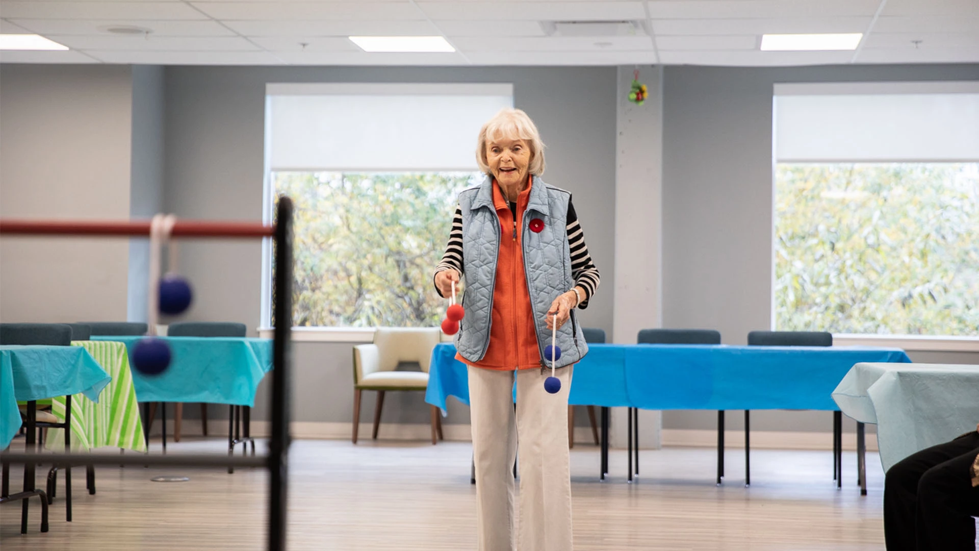 lady playing ladder toss